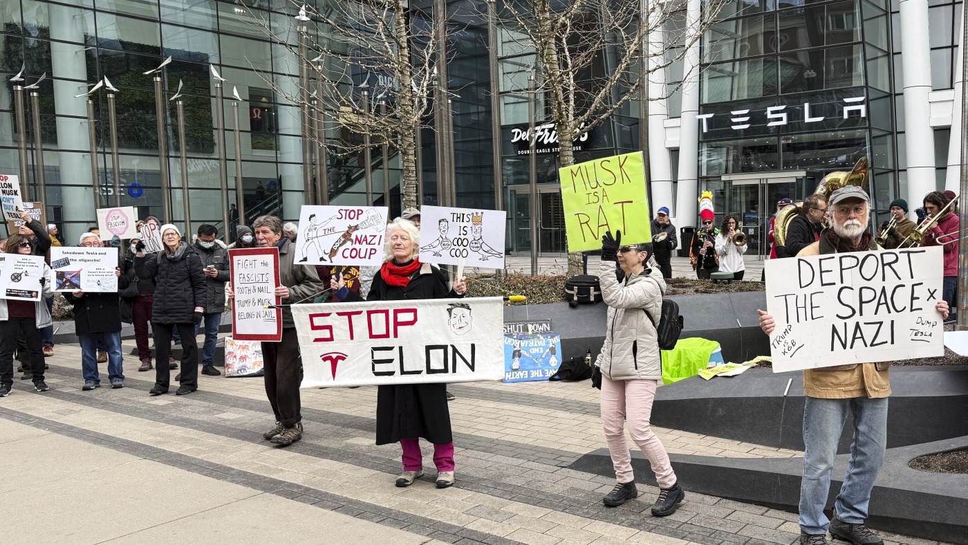 Elon Musk claims Tesla protest organizer committed crimes : NPR