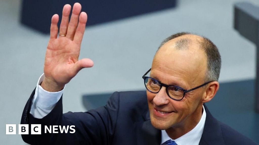 Germany’s Merz wins vote for chancellor after surviving historic defeat