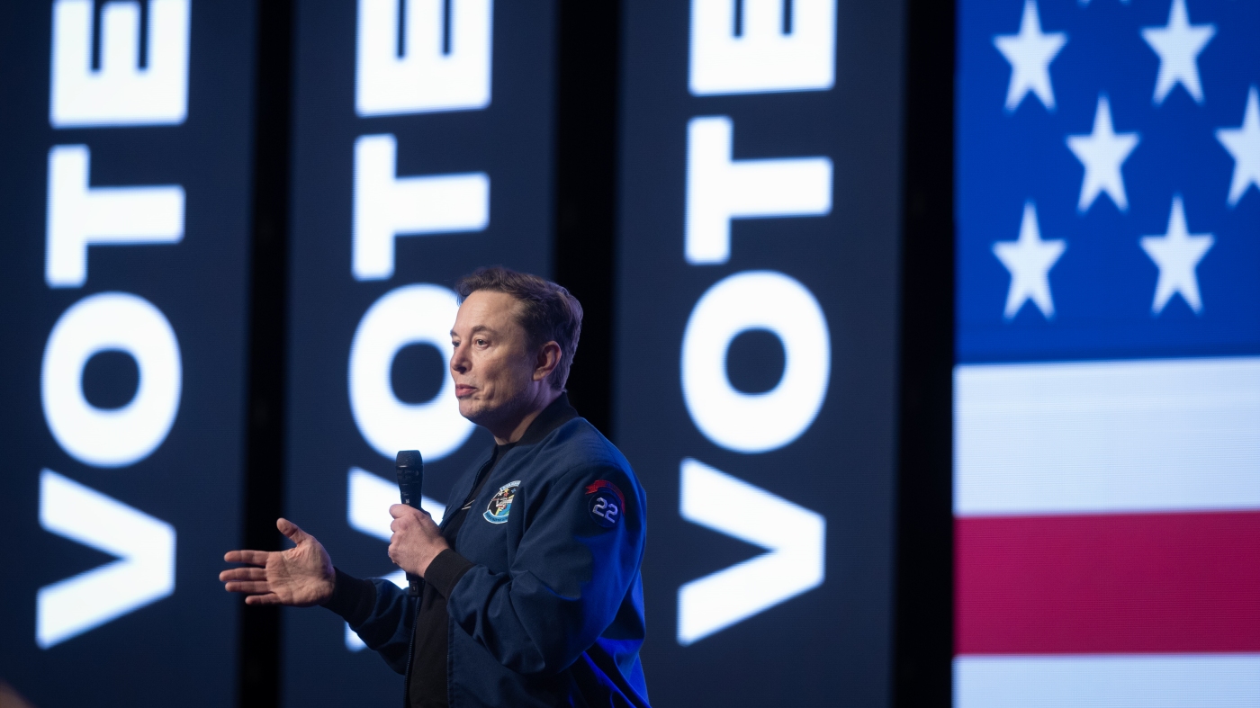 Musk to slow down political spending as he focuses on Tesla : NPR