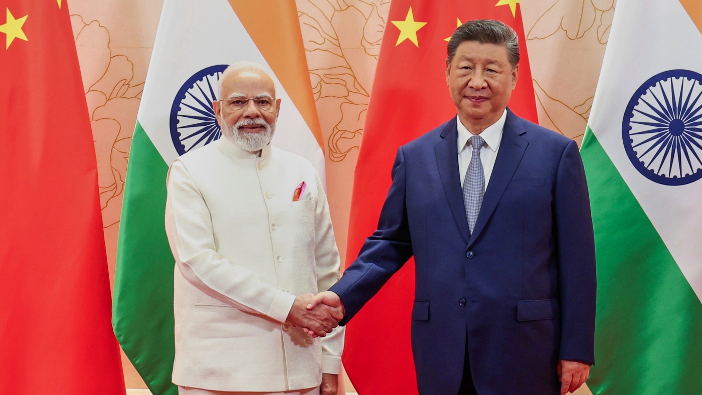 China’s Xi and India’s Modi vow to resolve border differences at meeting in Tianjin : NPR