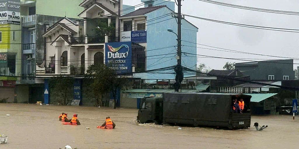 VIDEO: Police rescue baby from deadly flooding that killed at least 41 in Central Vietnam